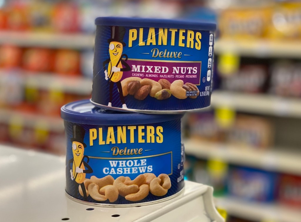 two cans of Planters nuts