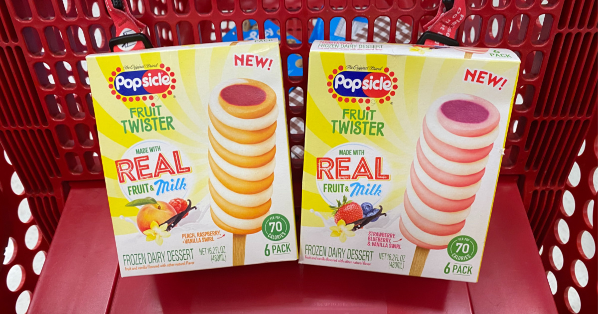 two boxes of fruit and cream popsicles in red store cart