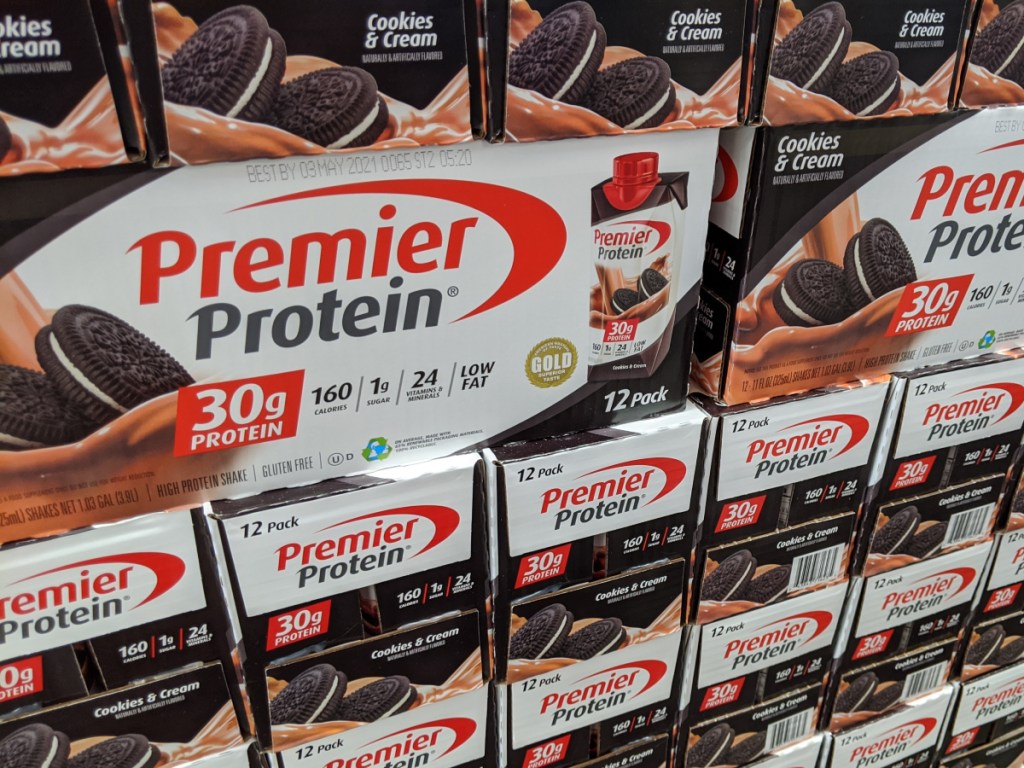 packs of cookies & cream protein shakes stacked in store