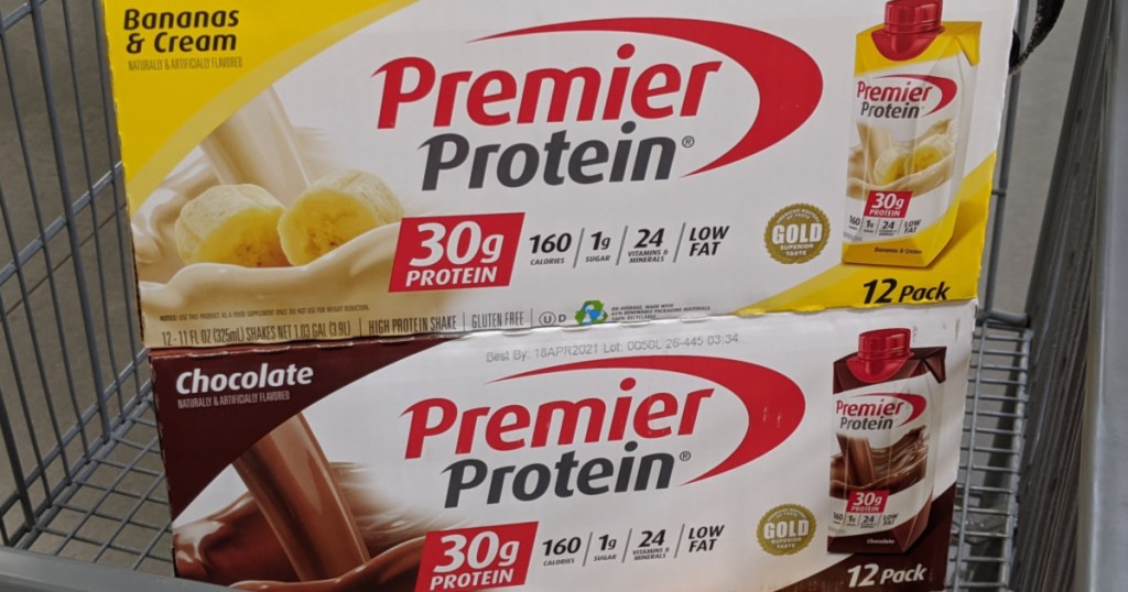 pack of chocolate protein shakes and pack of banana protein shakes in store cart