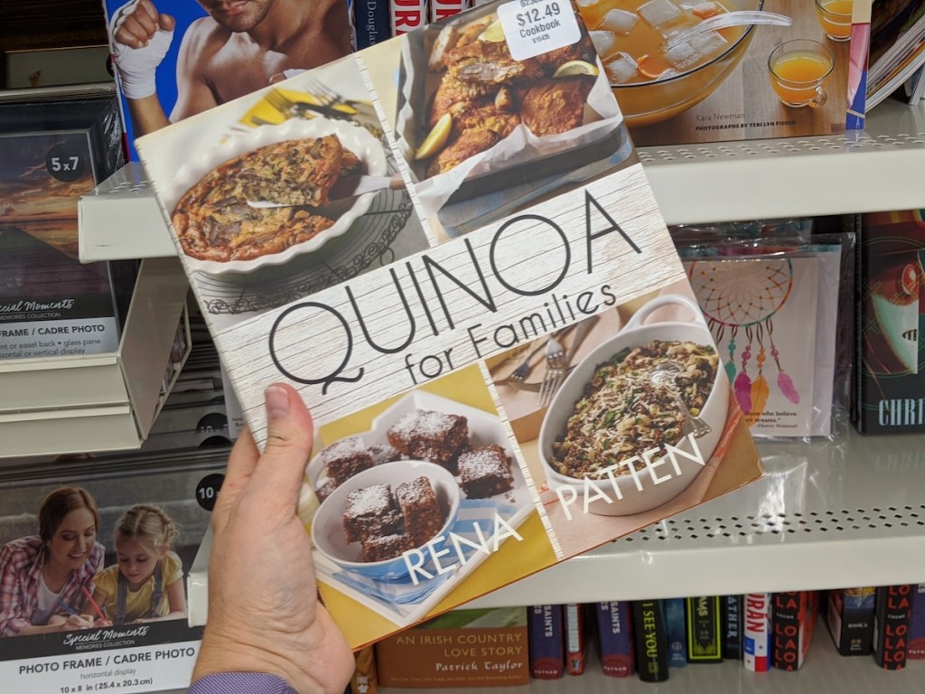 hand holding a Quinoa for Families book