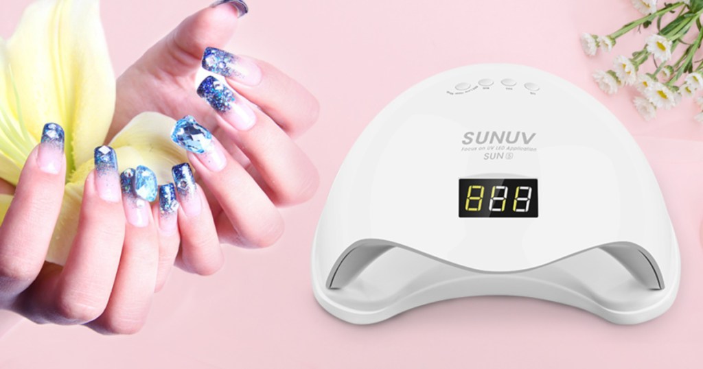 sunuv nail dryer with painted nails beside it