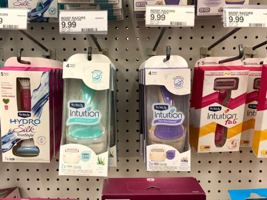 schick intuition razors hanging on shelf in store