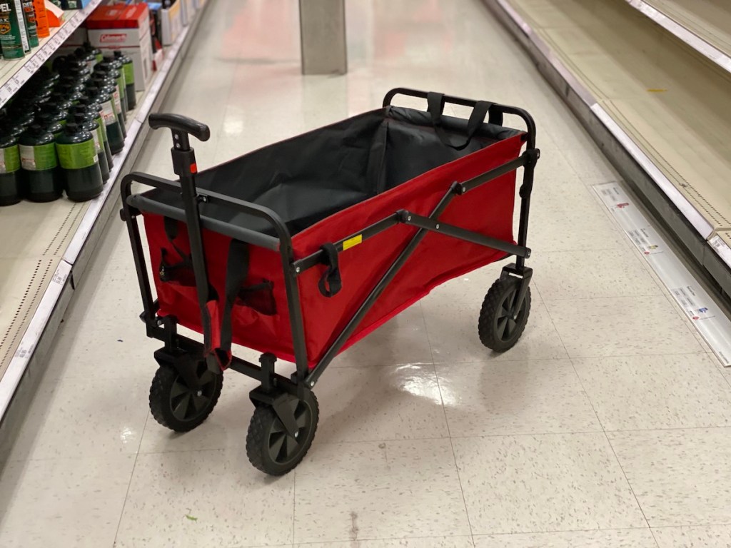 red Seina Utility Wagon with Side Straps open inside of store