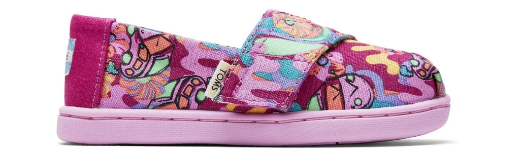 pink slip on toms shoes with velcro strap and abstract print