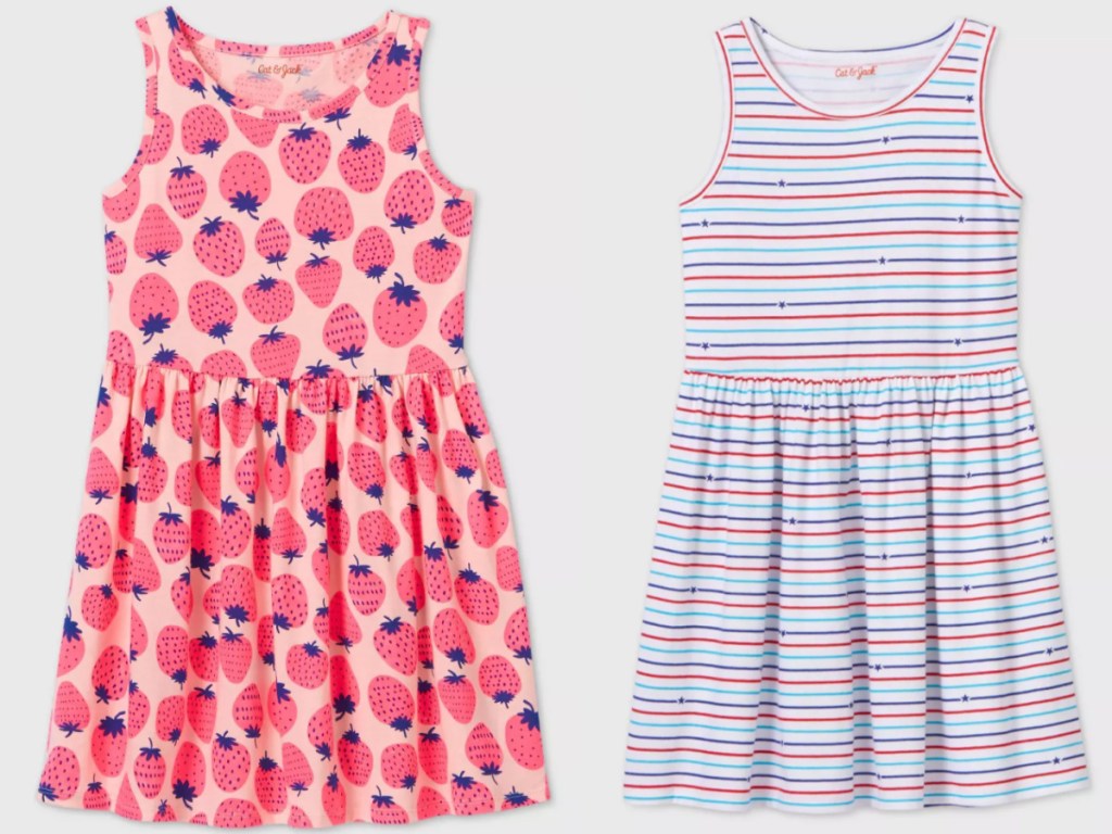 girls strawberry dress next to a red, white and blue striped dress