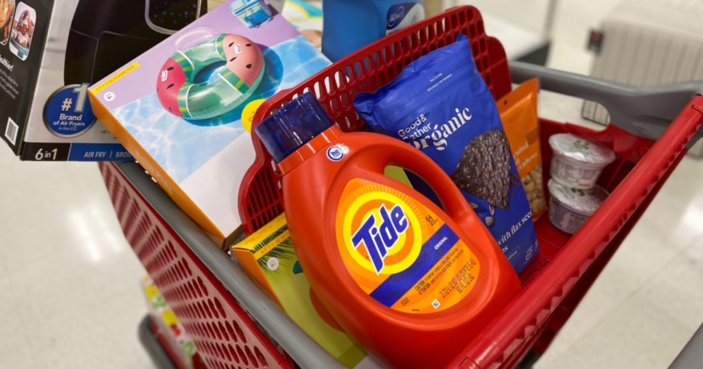 target cart with tide, pool float, chips, and more