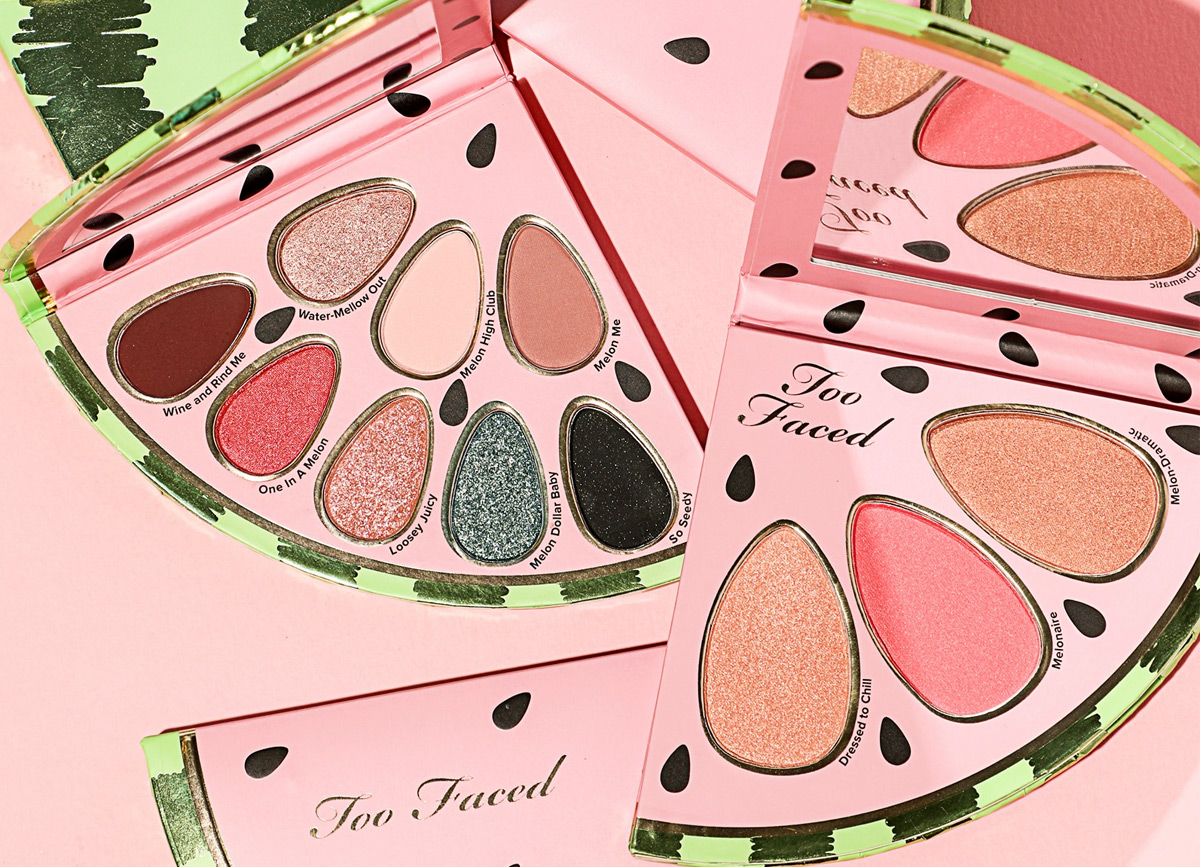 watermelon slice shaped eyeshadow palette and blush palette on pink background