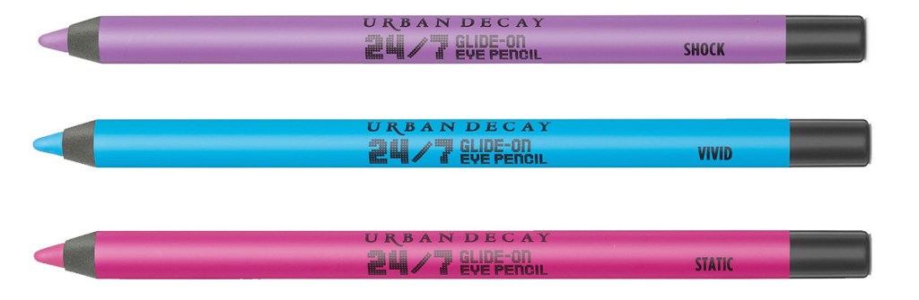 three urban decay eyeliner pencils in neon pink, blue, and purple