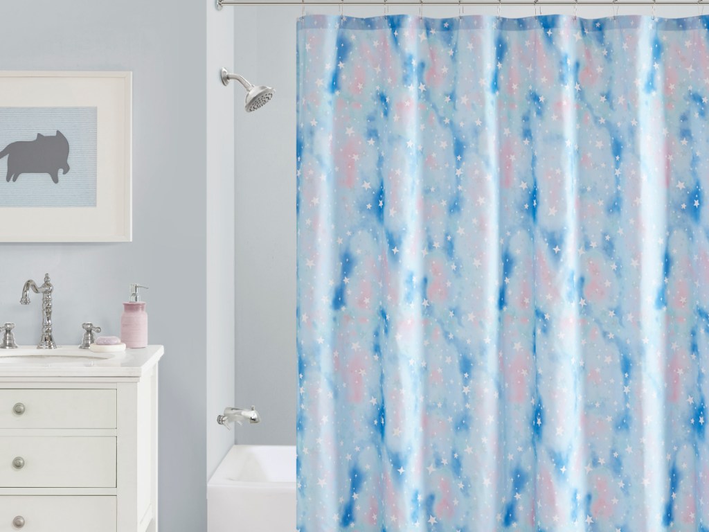 pink and blue star shower curtain in bathroom
