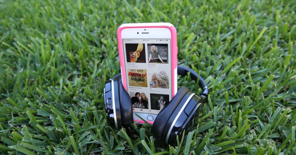 amazon music on app with headphones around the phone