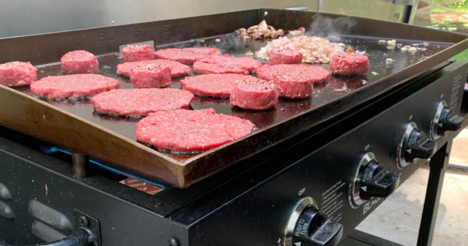 burgers cooking on blackstone griddle