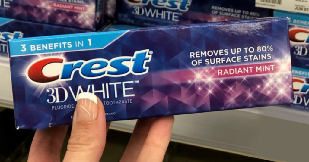 crest 3D white toothpaste in hand