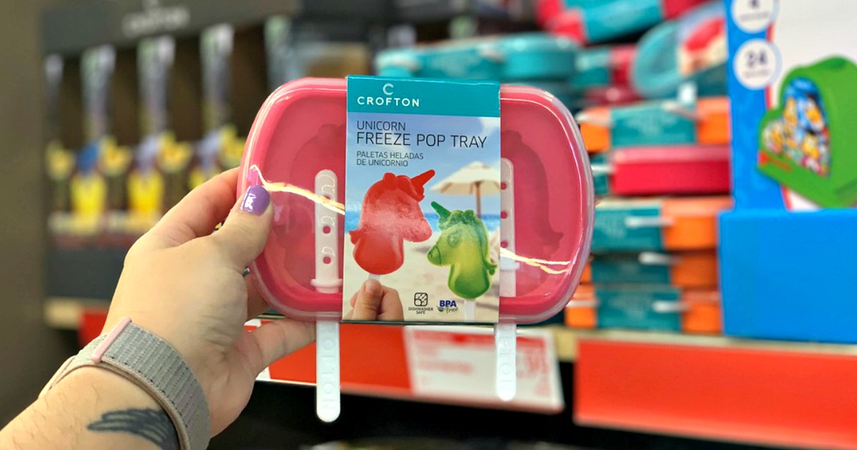 hand holding pink unicorn ice pop mold in store