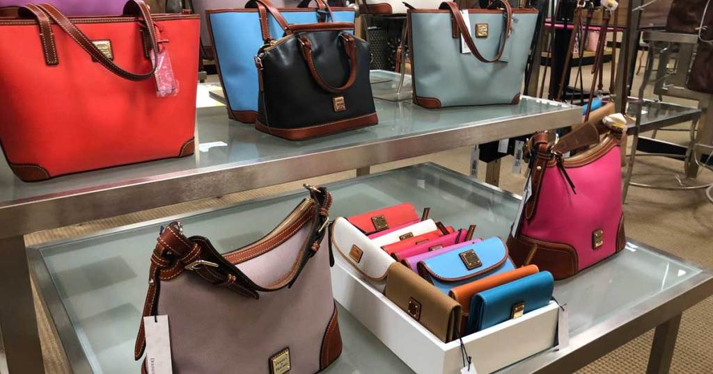 dooney & bourke purses on display in store