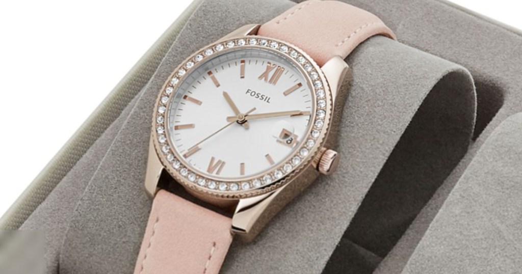 fossil pink watch on display case