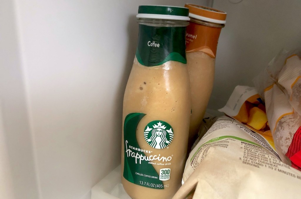 two bottles of starbucks frappuccino in freezer