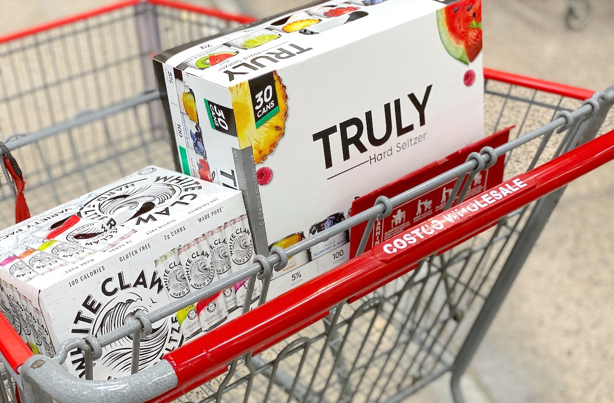 box of white claw and truly hard seltzer drinks in costco cart