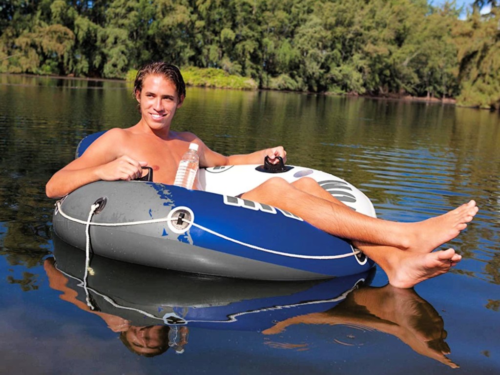 man lounging on an Intex River Run 53-Inch Inflatable Water Float