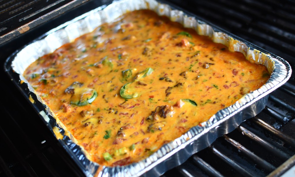 melted cheese dip on grill