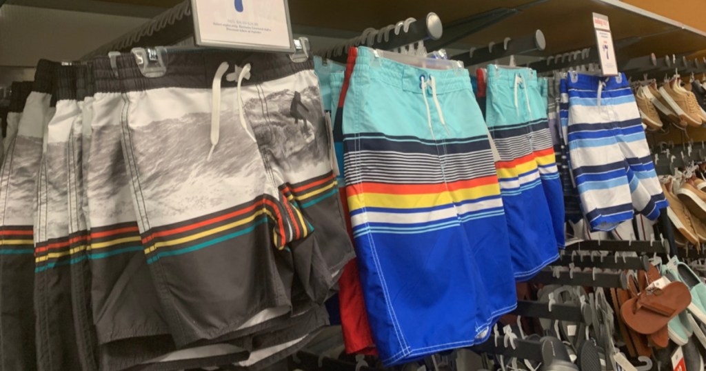 boys swim trunks on store display