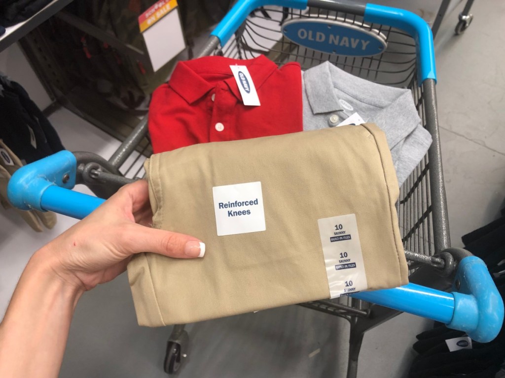 old navy kids uniforms in a cart