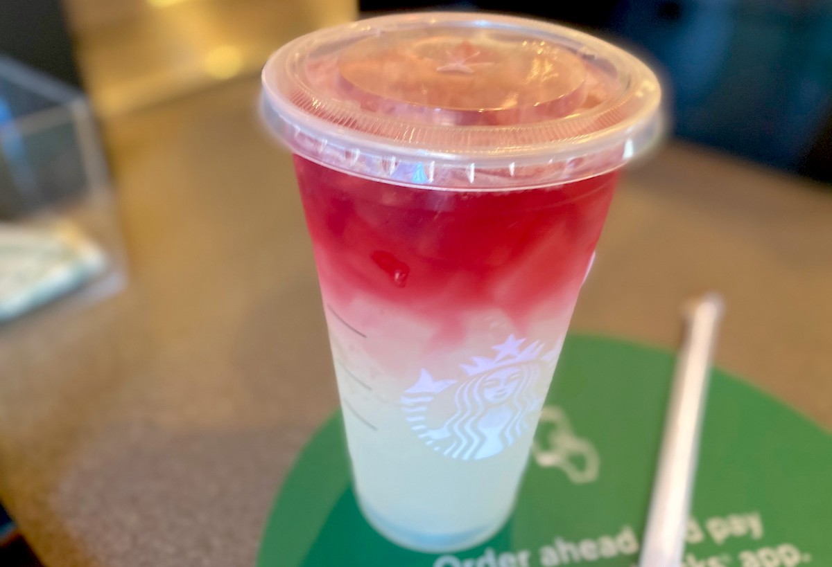 red and white ombre starbucks firecracker drink on counter