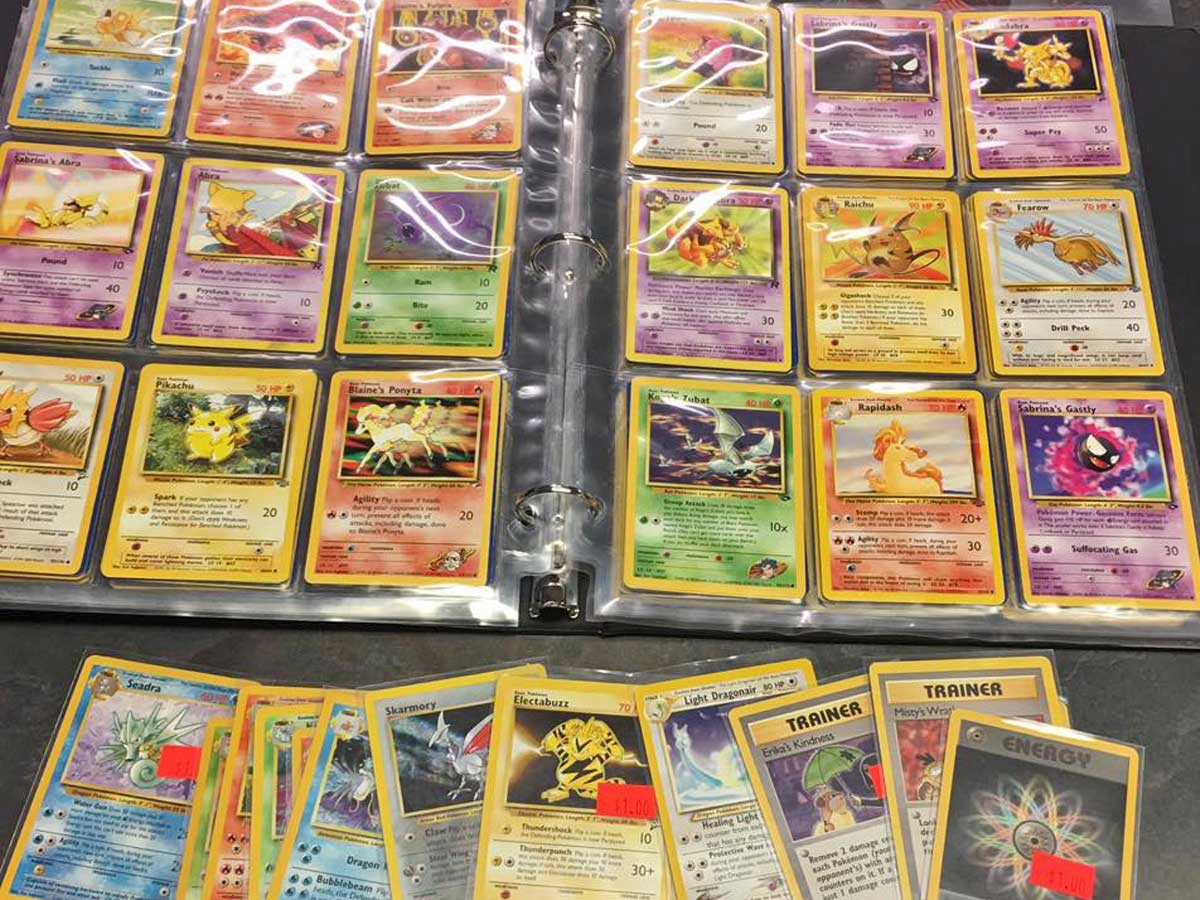 binder full of trading cards opened