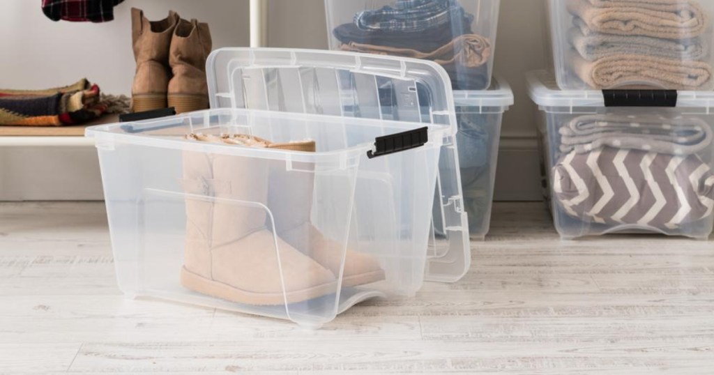 brown boots in clear storage bin