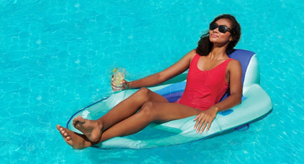 woman lounging on pool float