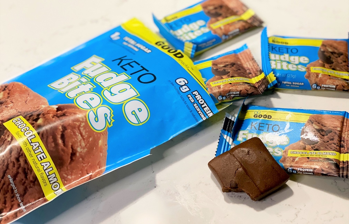 open bag of keto fudge bites spilled out on counter