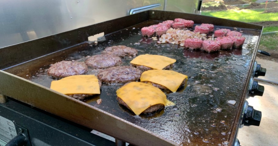cheeseburgers on a griddle