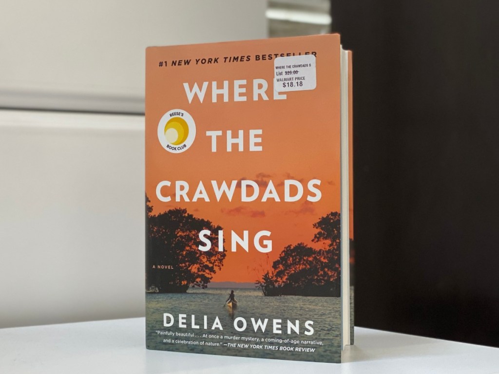 Where the Crawdads Sing book standing on white dresser