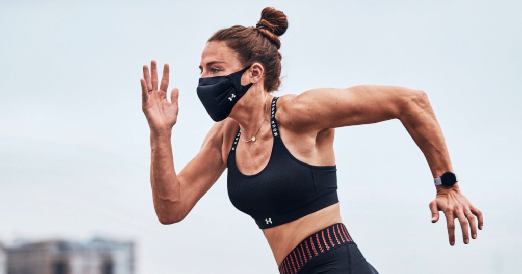woman wearing a UA SportsMask while running