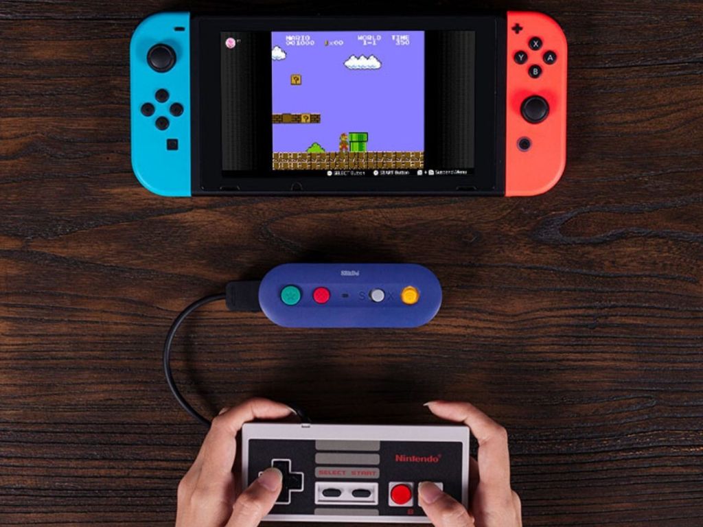 nintendo switch being played with original nintendo controller