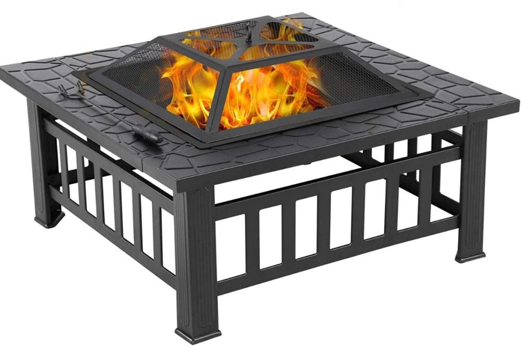 A fire burning in a square fire pit