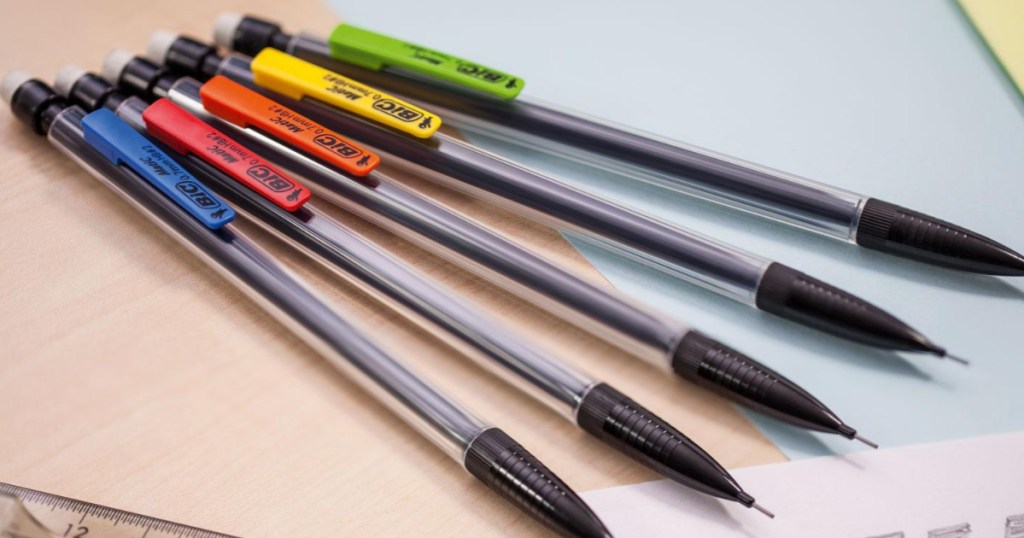 BIC Mechanical Pencils laying side by side on a piece of paper 