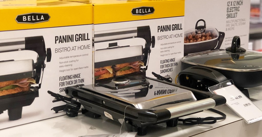 stainless steel panini press on display at store in front of yellow and white boxes