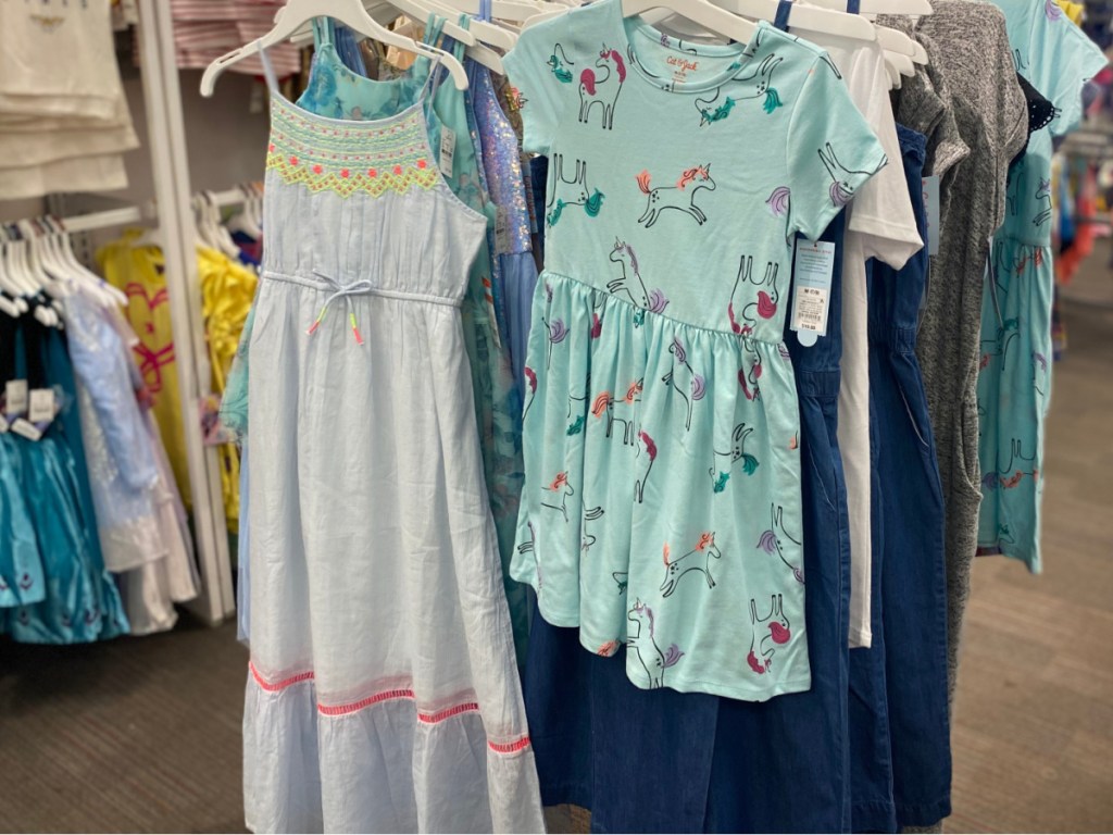 girls dresses hanging in store
