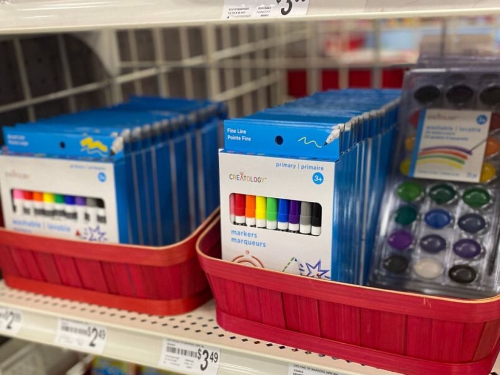 packages of markers and paint at store 