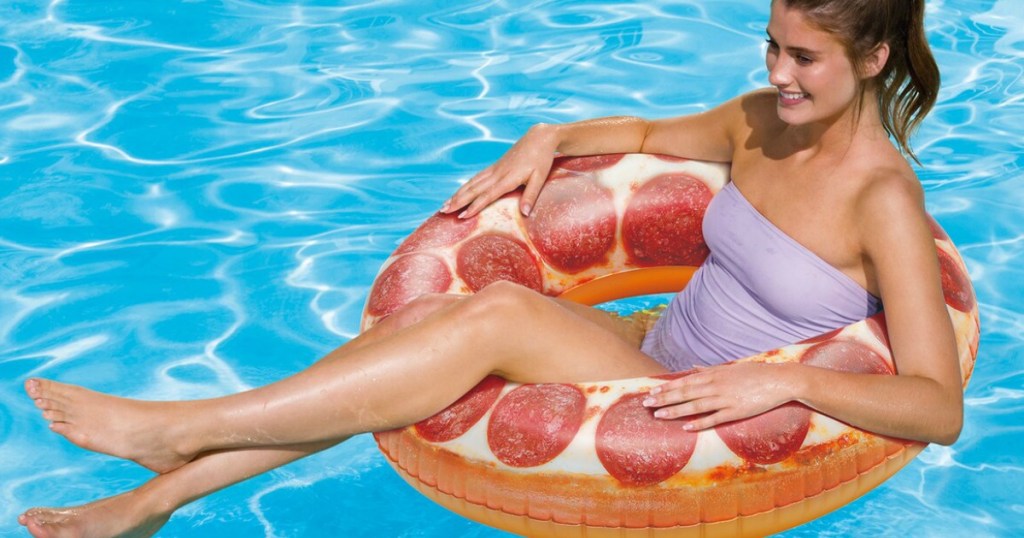 woman on a pool float that looks like pizza