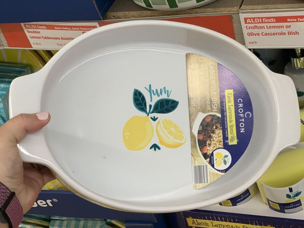 hand holding up oval casserole dish