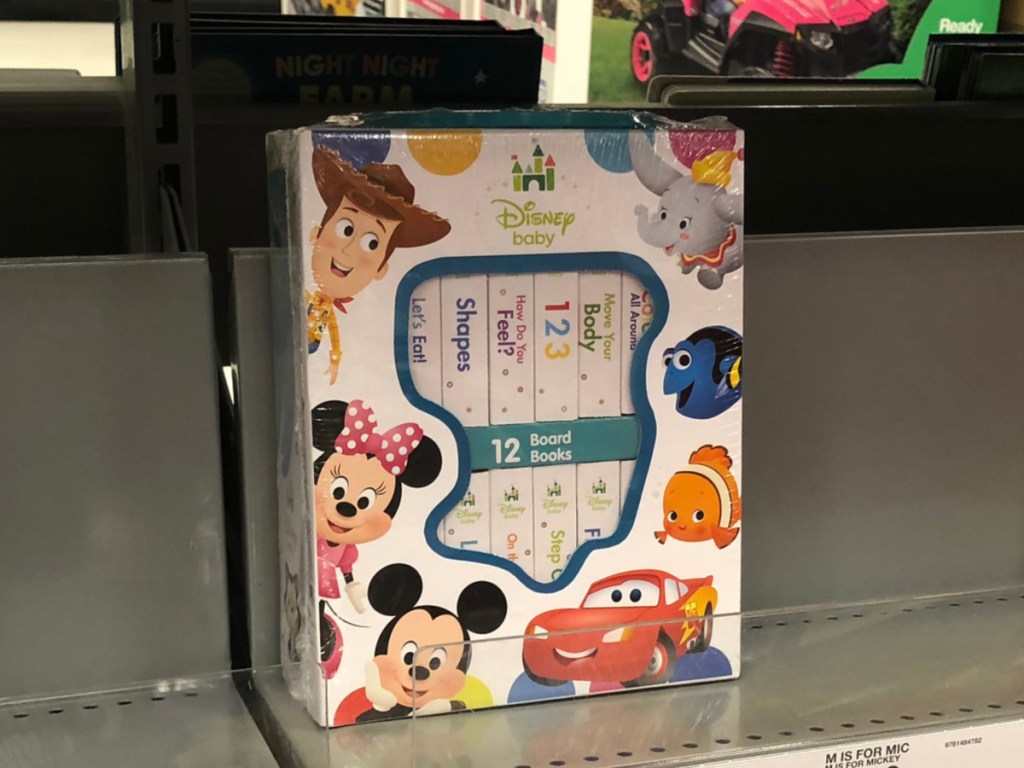 Disney Baby Board Book Set sitting on grey store shelf 