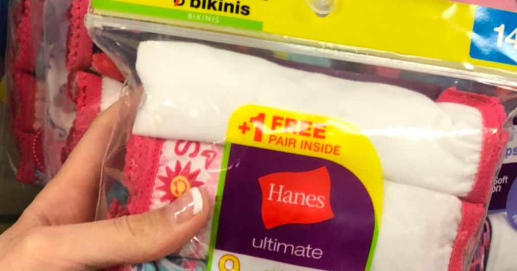 hand holding a pack of Hanes underwear