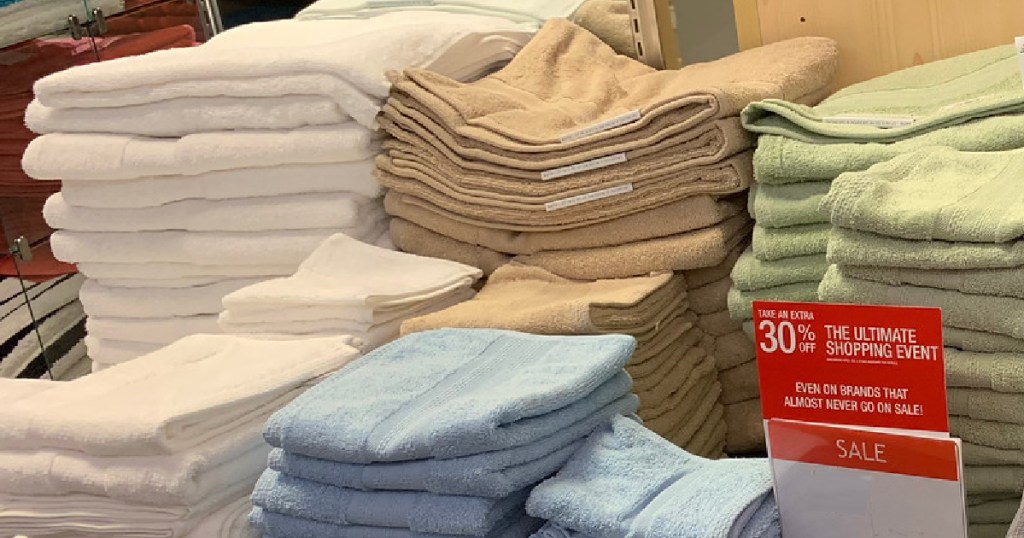 various colored bath towels on display in store