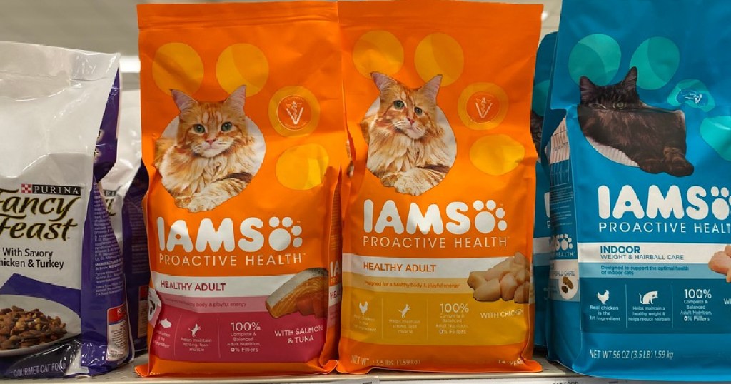three bags of cat food on shelf