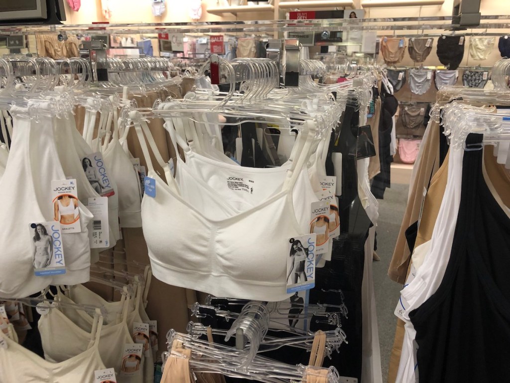 rack with white jockey bras and bralettes in store