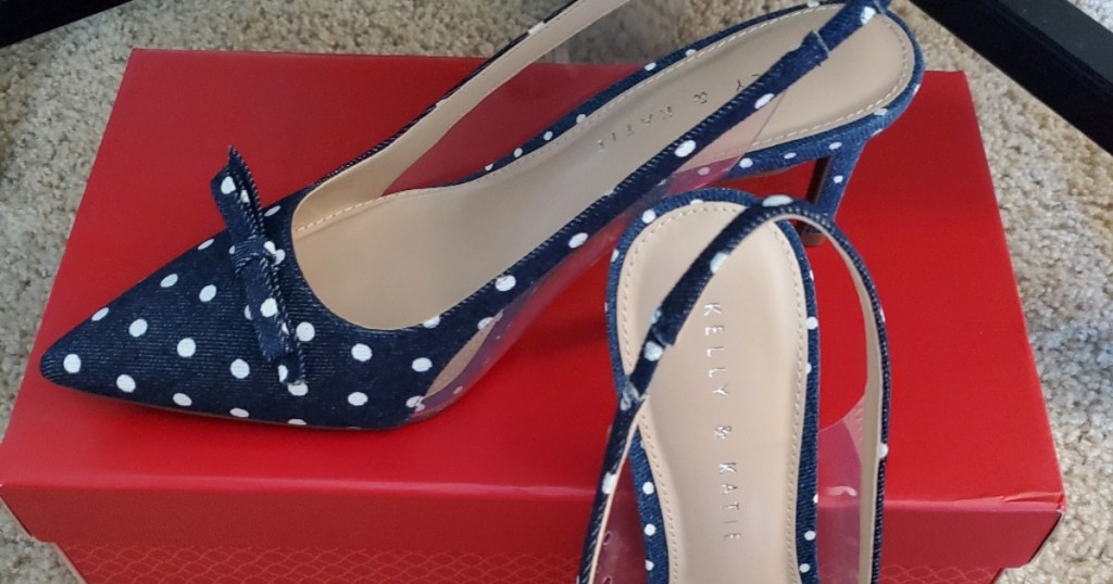 blue and white polka dot heels on red shoe box