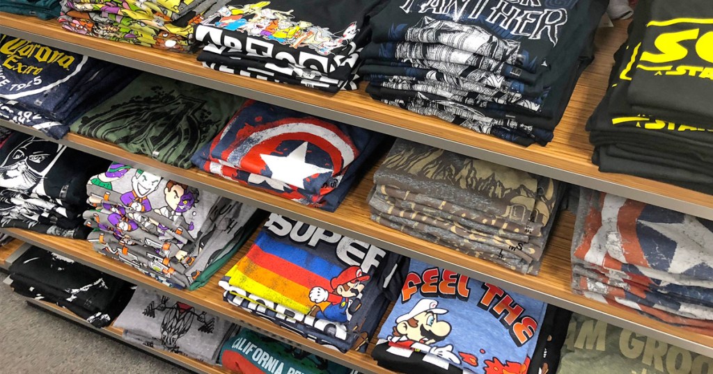 store display shelves full of folded graphic tees