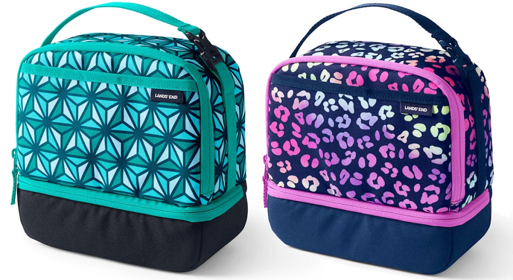 two kids lunch boxes in green floral print and pink and blue cheetah print